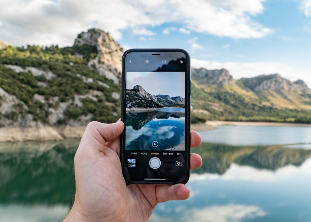 Person using a smartphone camera, illustrating visual and multimodal search